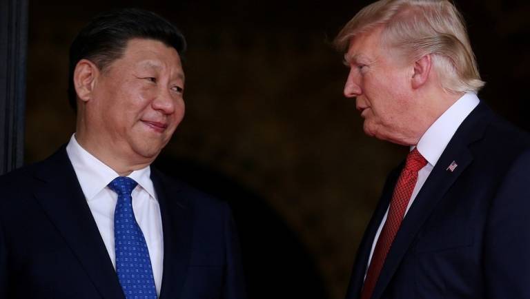 Xi Jinping (i.) y Donald Trump